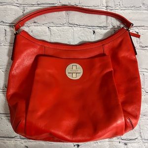 Kate Spade Large Hobo Handbag, Orange Leather With Black Polka Dots Inside.